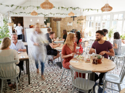 Lunchtime customers eating at a busy restaurant